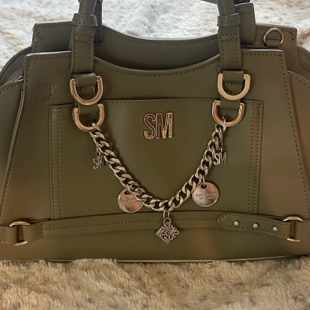olive green hand held Steve Madden purse
